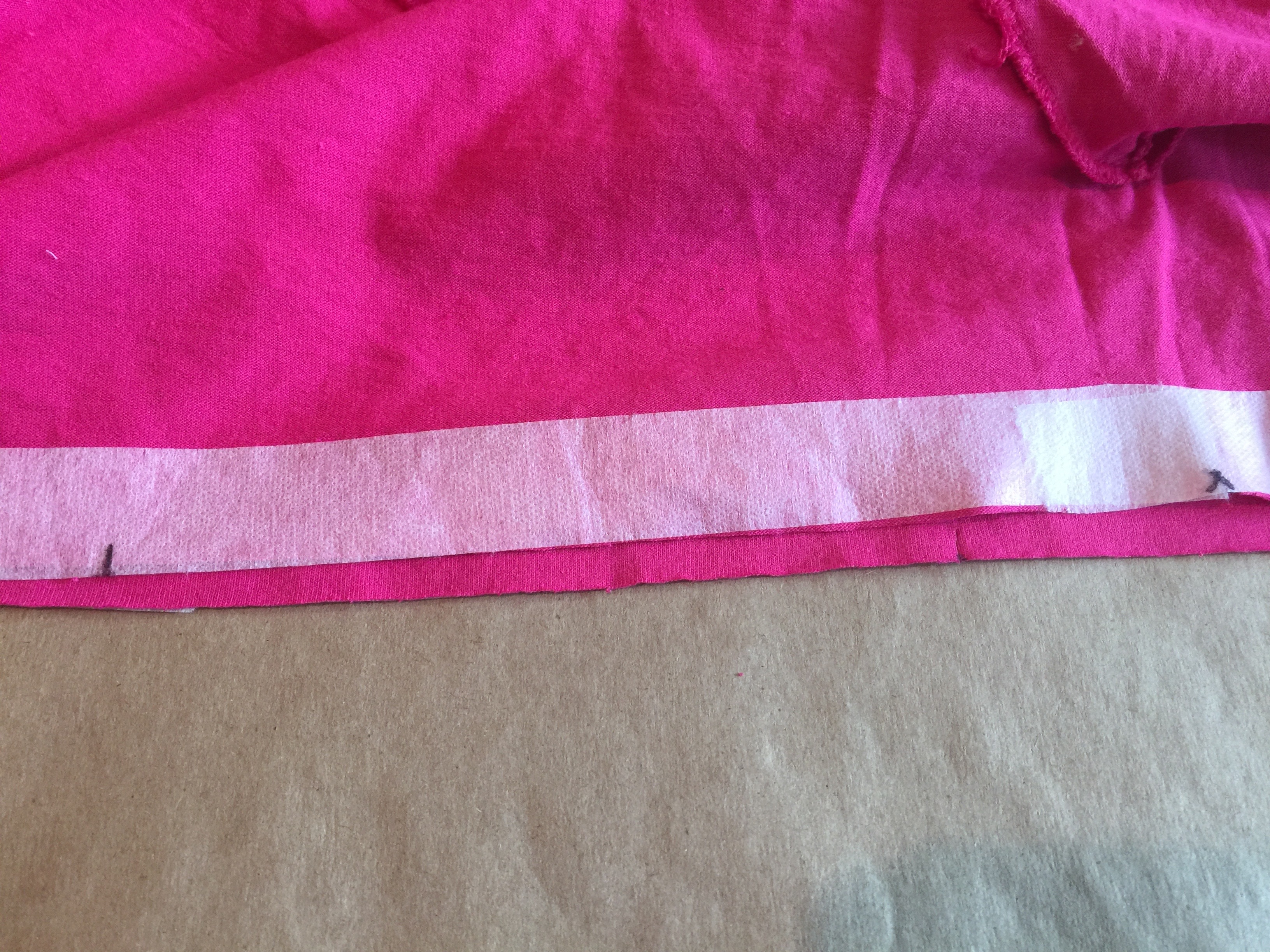 03 cutting the shirt  mark center and sides fuse interfacing to wrong side of shirt.jpg