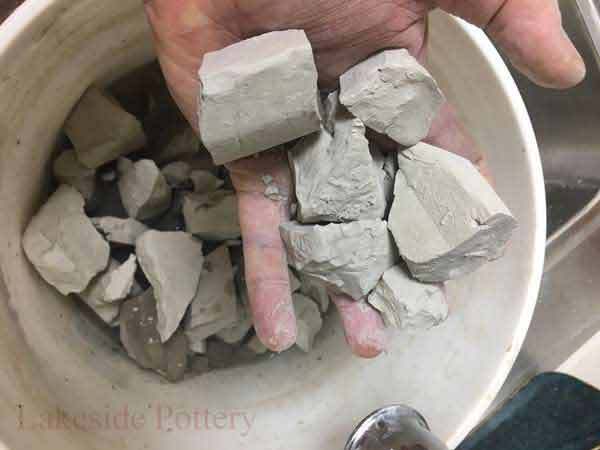 10-add-other-bone-dry-clay-to-bucket.jpg