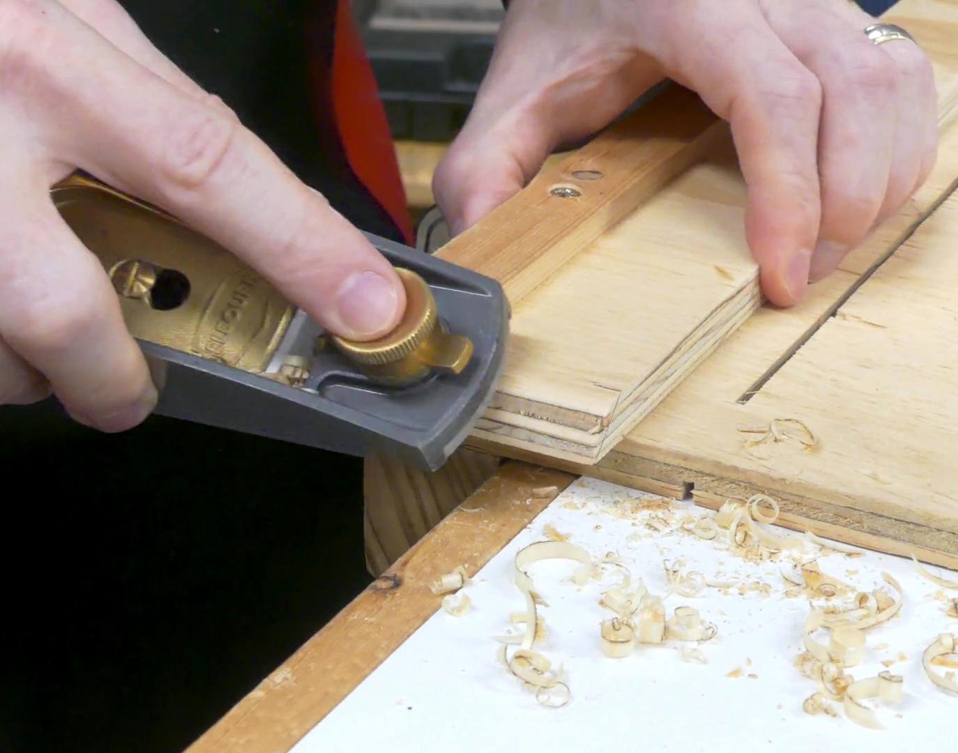 20 - Using a Block Plane to Round Over the Shelf Ends.jpg