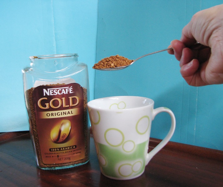 4 put coffee in mug.JPG
