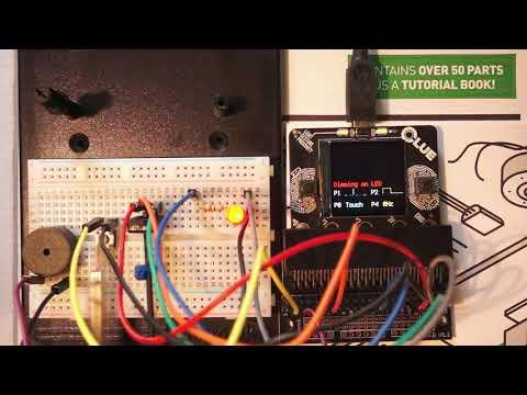 Adafruit CLUE running MicroPython code from Kitronik's Inventor's Kit Experiment 3 with Music