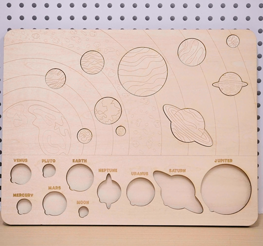 An educational toy-wood planet puzzle is done with thunder bolt.png