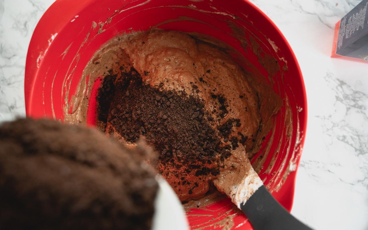 Bat &amp; Spider Halloween Cupcakes - Folding In Oreo Crumbles And Chocolate.jpg