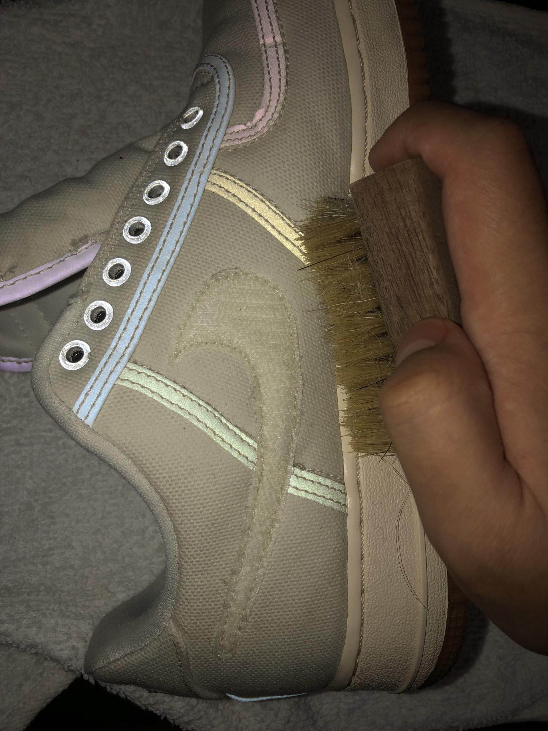 Brushing the shoe.jpg