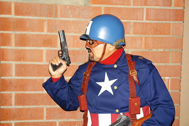 Cap Am Build Shield Front Close w pistol.jpg