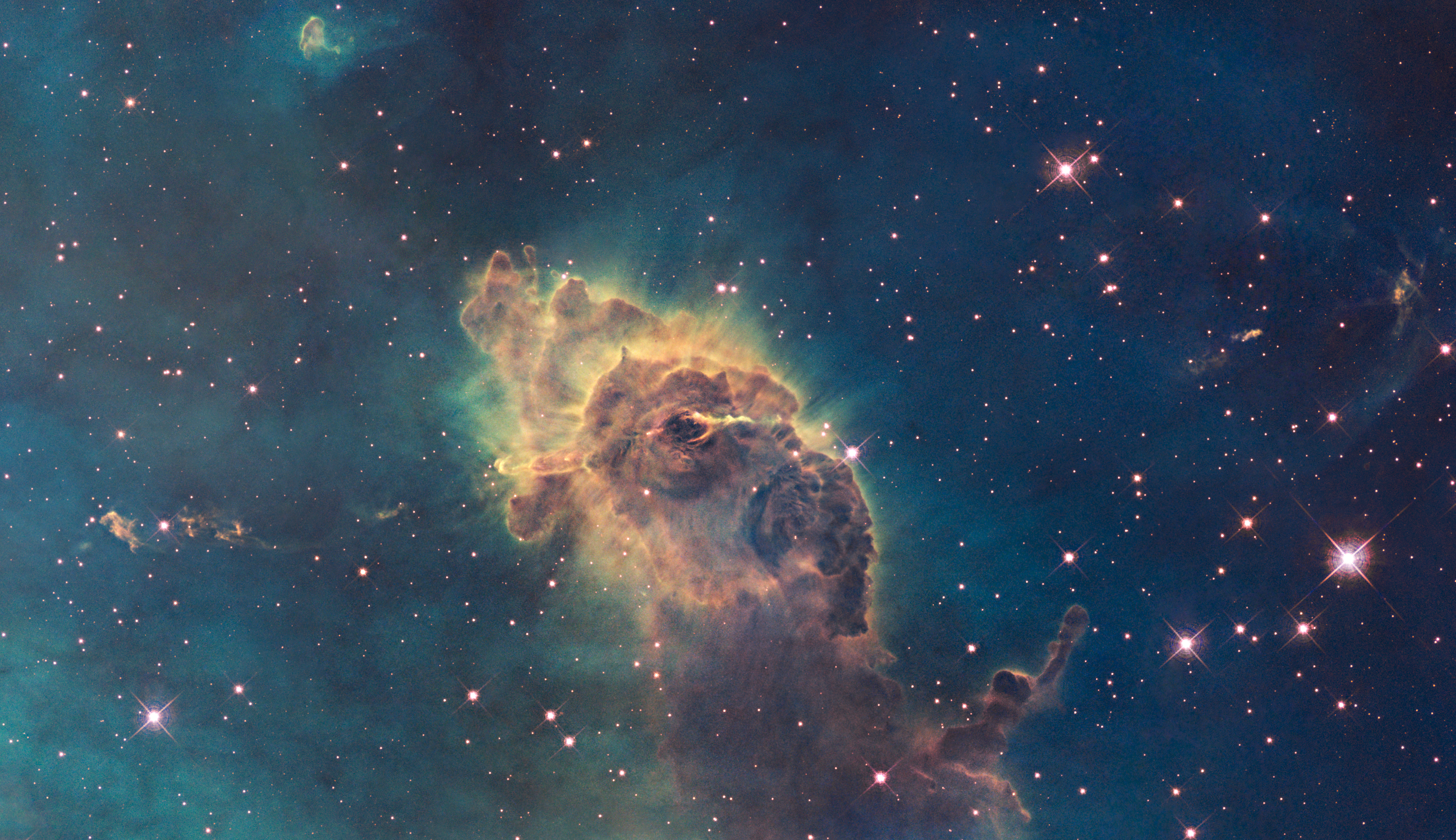 Carina_Nebula_in_visible_light_(captured_by_the_Hubble_Space_Telescope).jpg