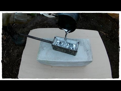 Casting Lead into the recently welded Steel Mold. Got 1.1 kg (2.5 lbs) ingot