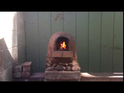 Completed mini earth oven fired for the first time!