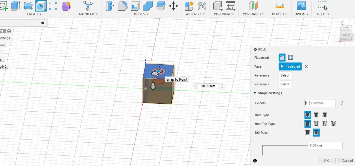 Creating a Hole in the cube and adding a cylinder.png