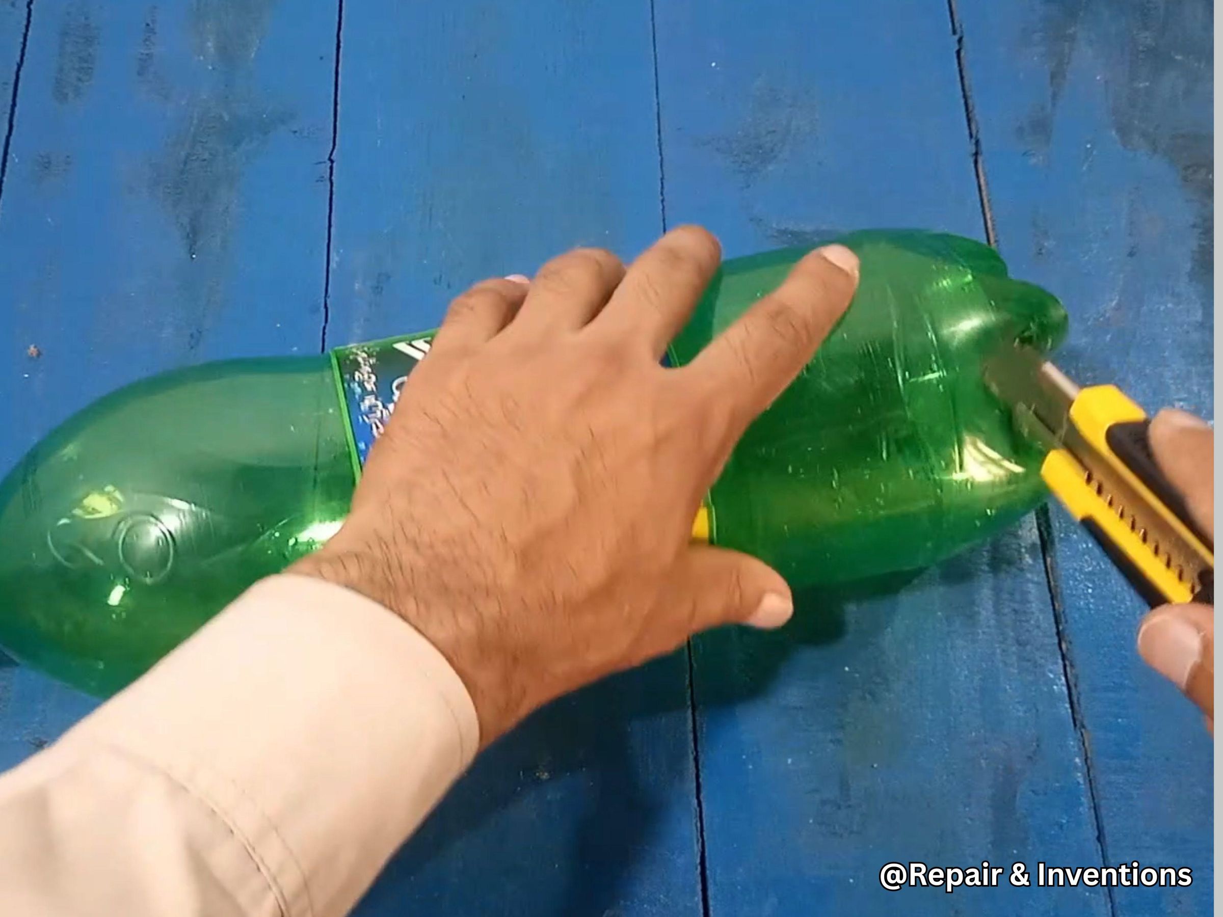 Cut the Bottom Part of the First Bottle.jpg