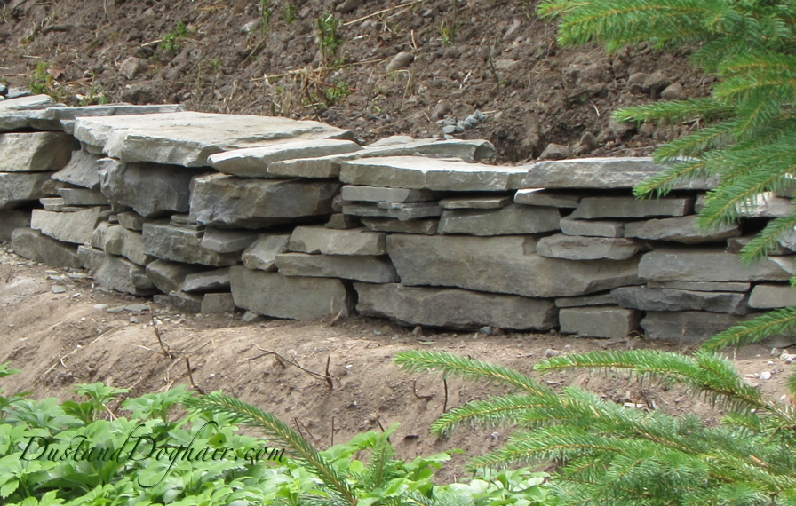 DIY Stacked Stone retaining wall.jpg