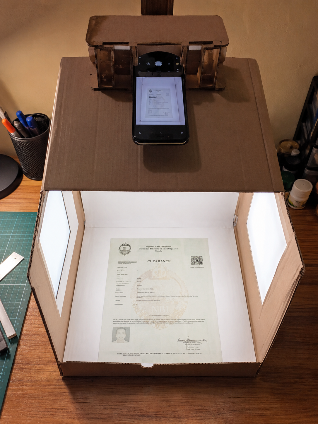 DIY document scanning setup on desk.png