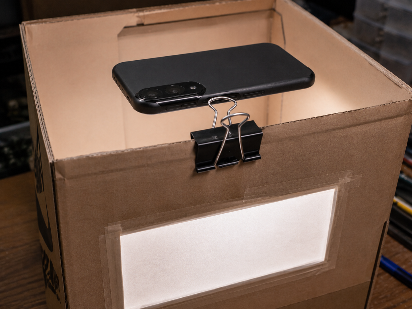 DIY lightbox photography setup close-up.png