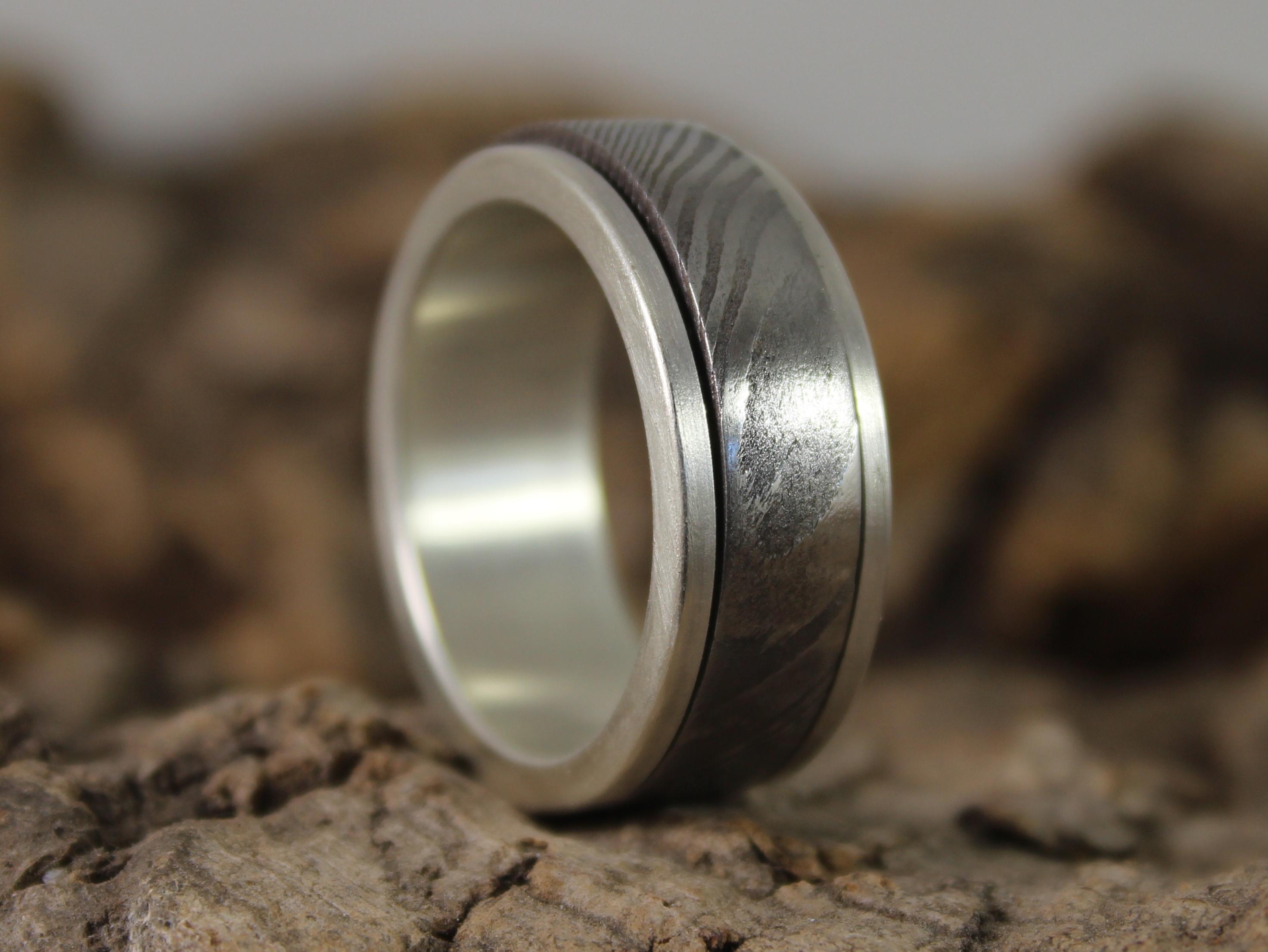 Damascus steel and silver spinner ring 4.JPG