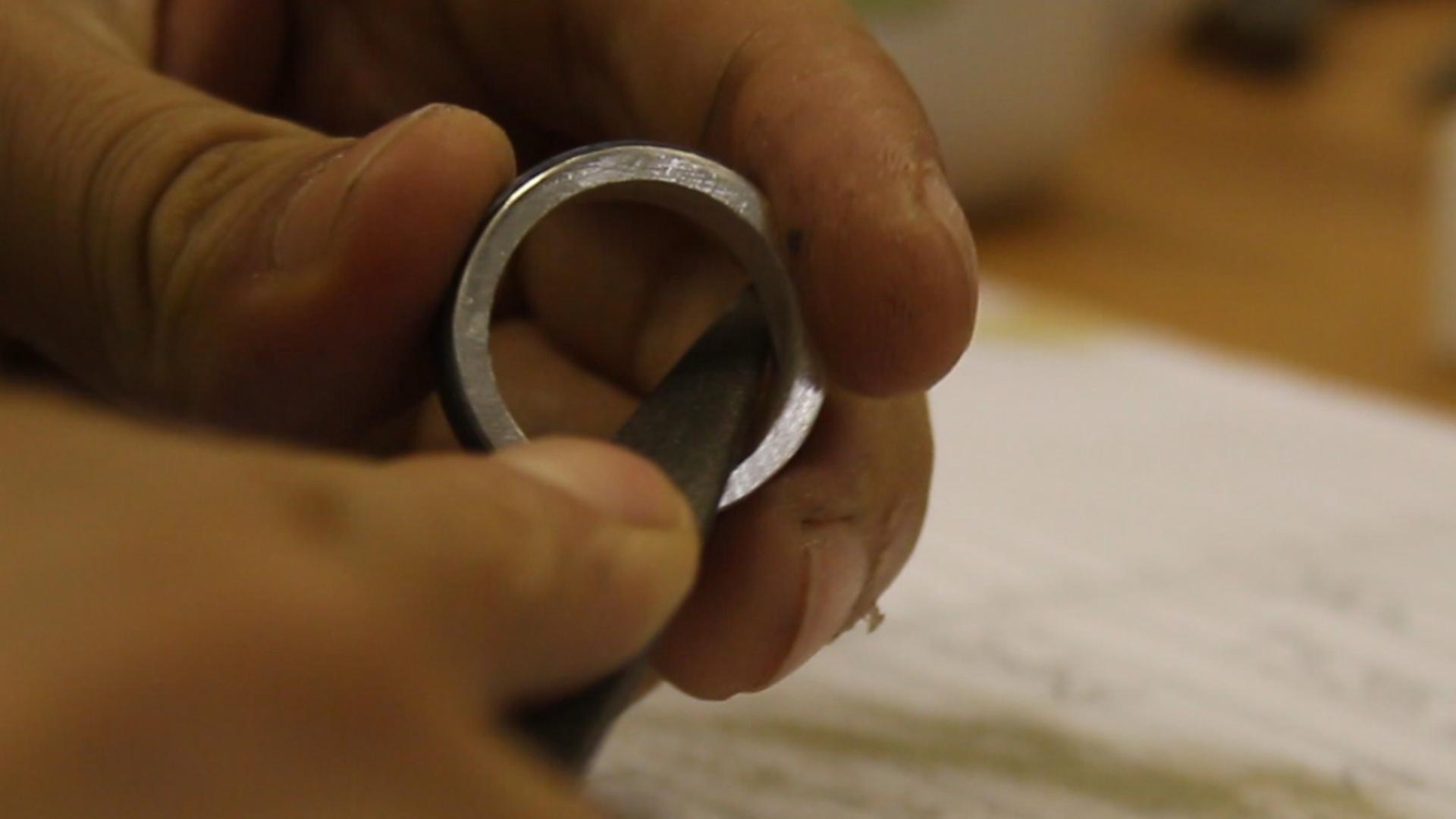 Damascus steel and silver spinner ring 62.jpg