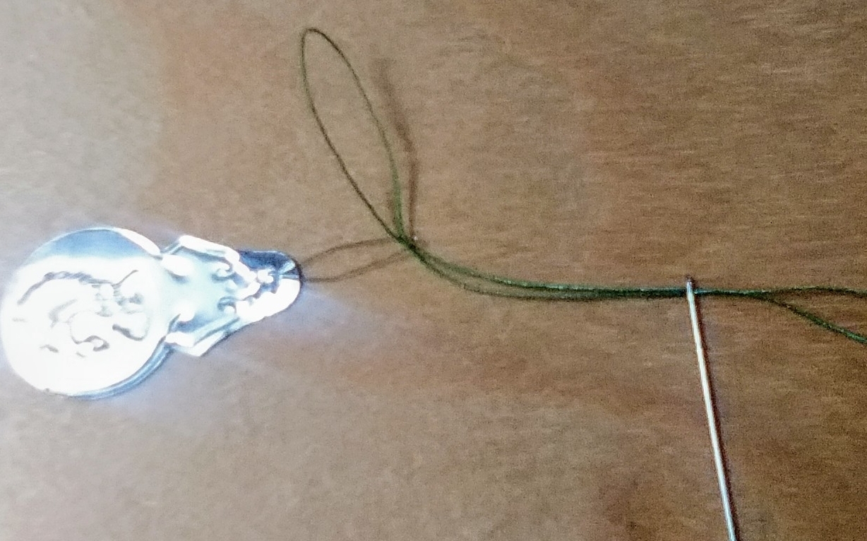 DoubleThreadThroughNeedle.jpg