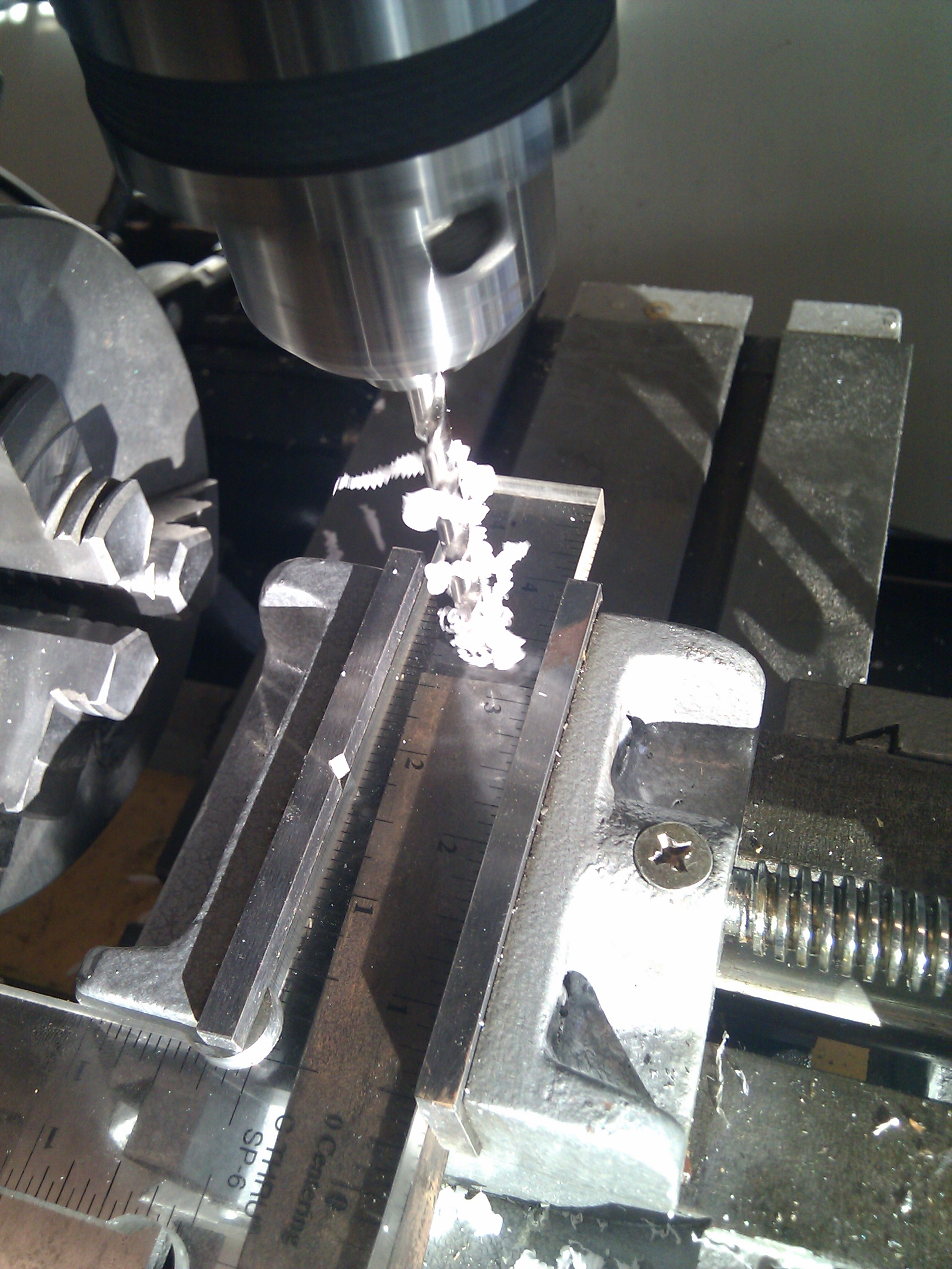 Drilling lucite ruler for keymaking jig.jpg