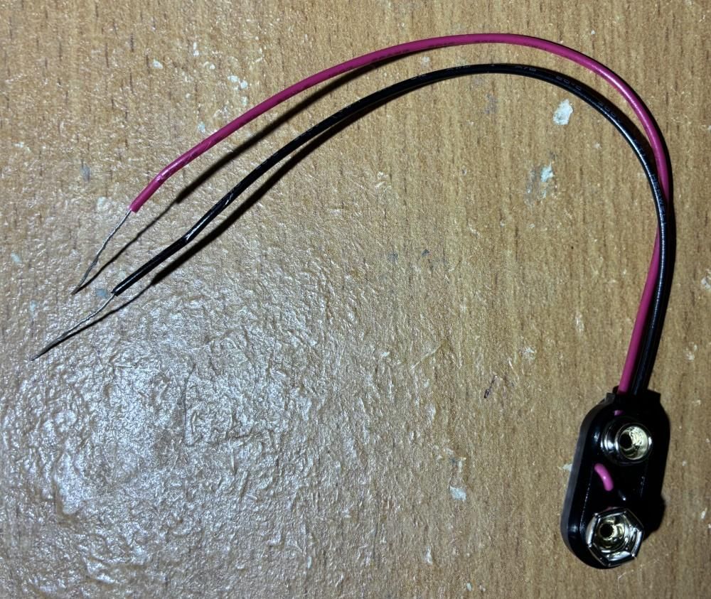 Flashing Traffic Lights 10 Step 06 Strip the Battery Harness Wires.jpg