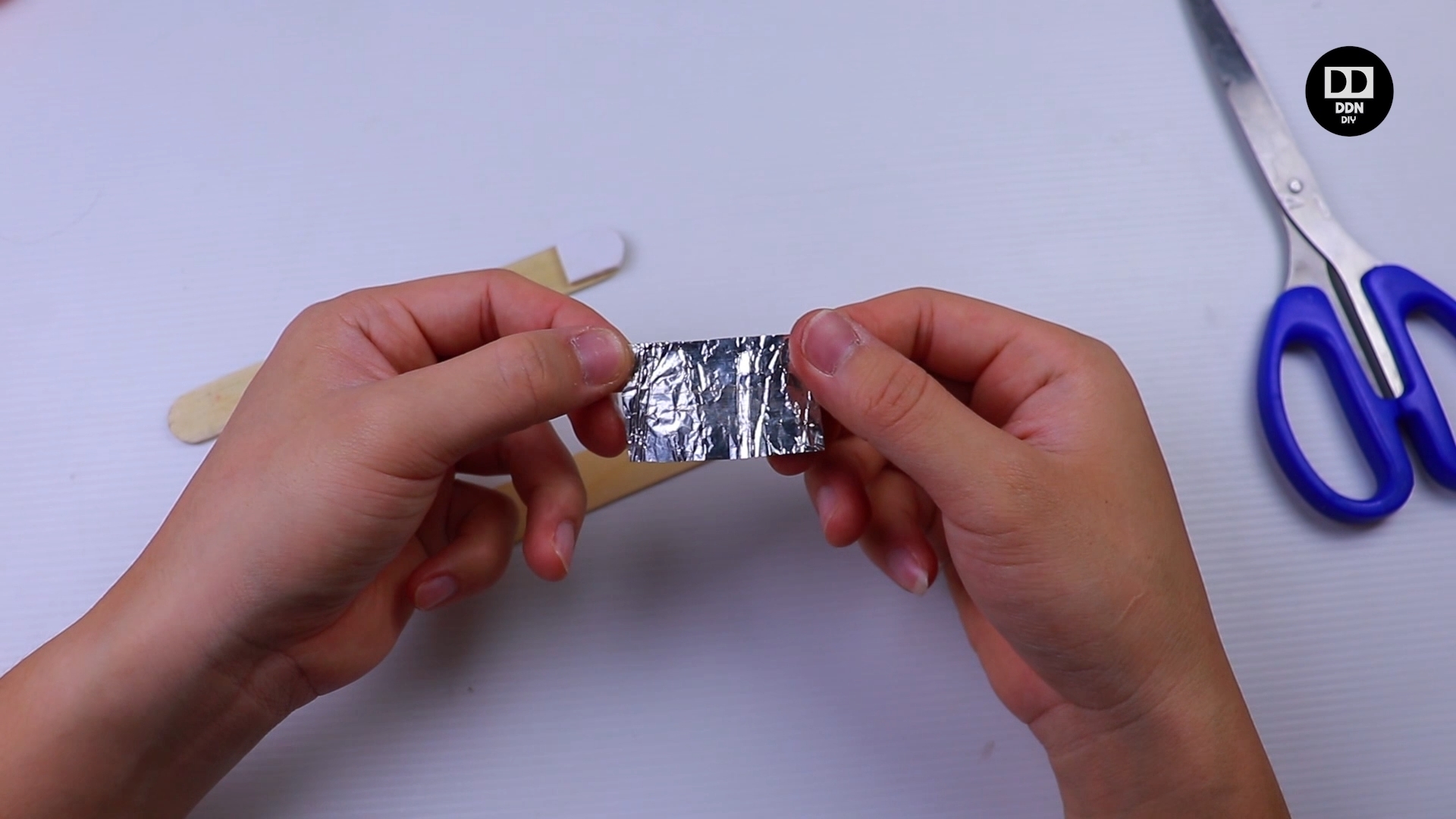 Foil helps conduct electricity from a person_s hand to the screen of a phone.jpg