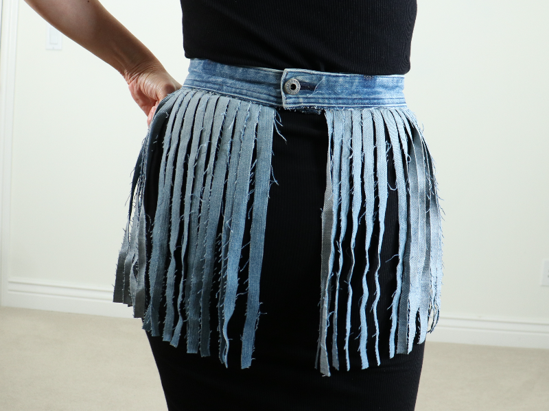 Fringe belt denim upcycle pockets closeup back (1).png