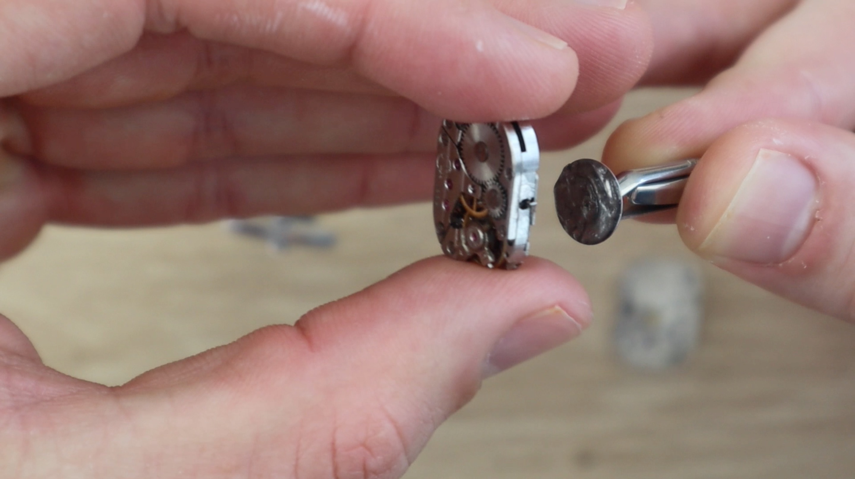 Gluing Movement onto Blank Cufflink.jpg