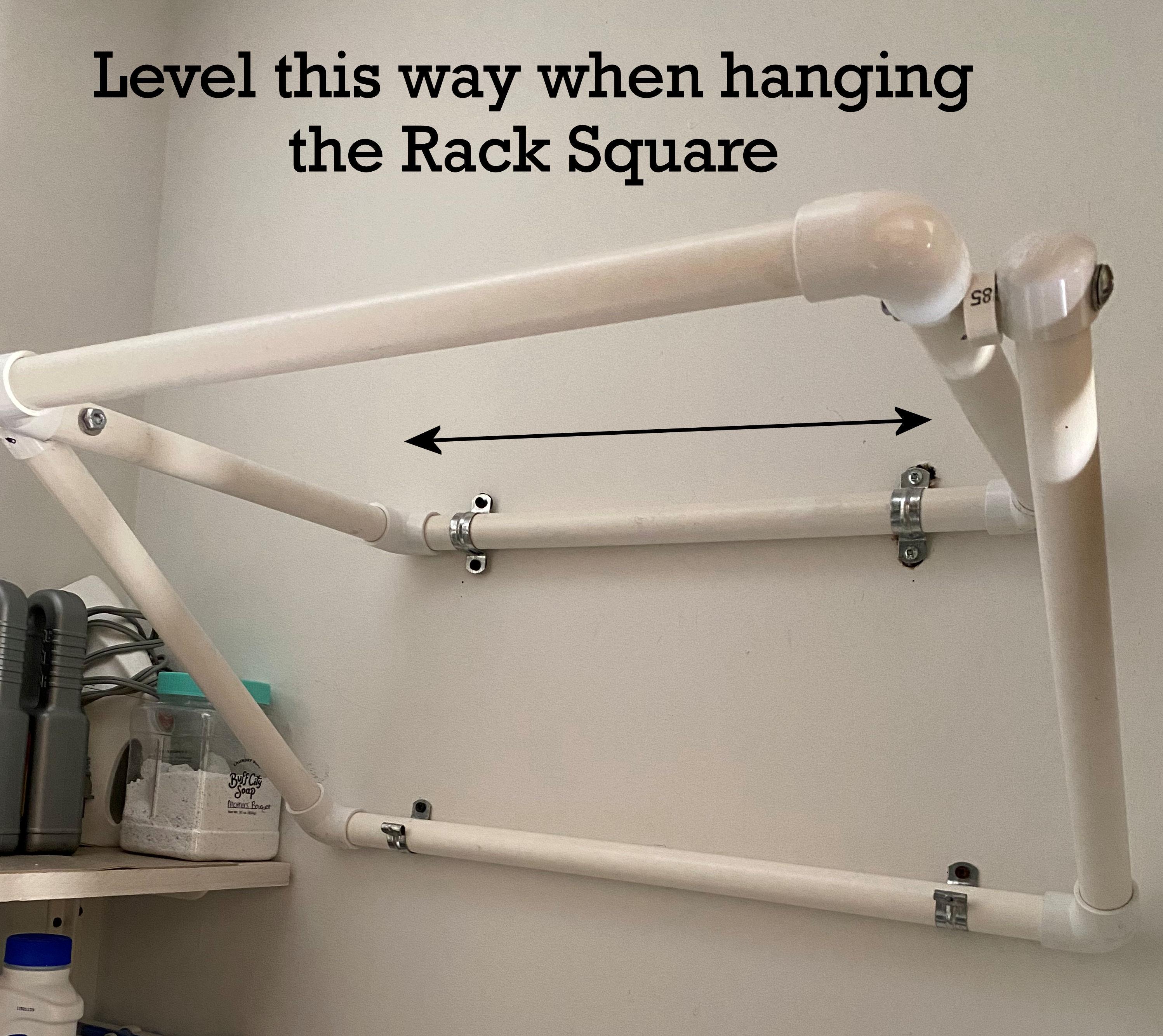 Hanging the rack square level.jpg