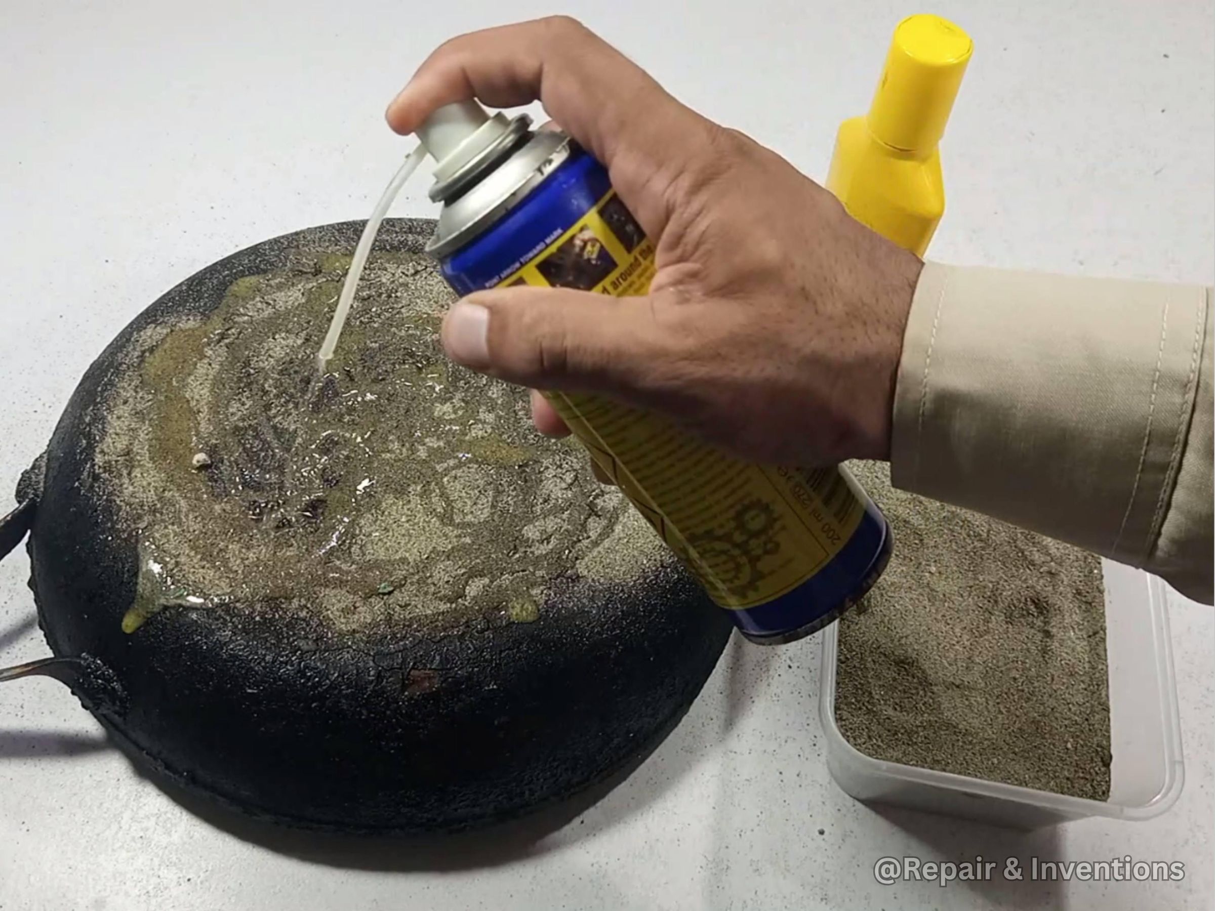 How to Remove Tough Stains Using WD-40 and Sand.jpg