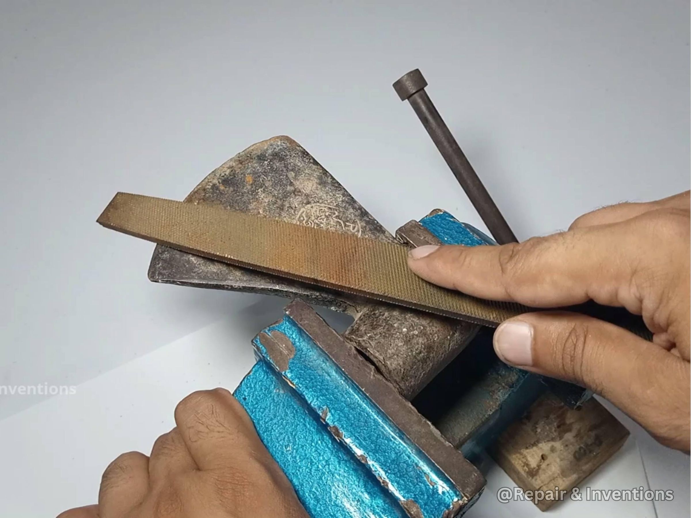 How to Sharpen a Dull Axe at Home Using Only a File.jpg