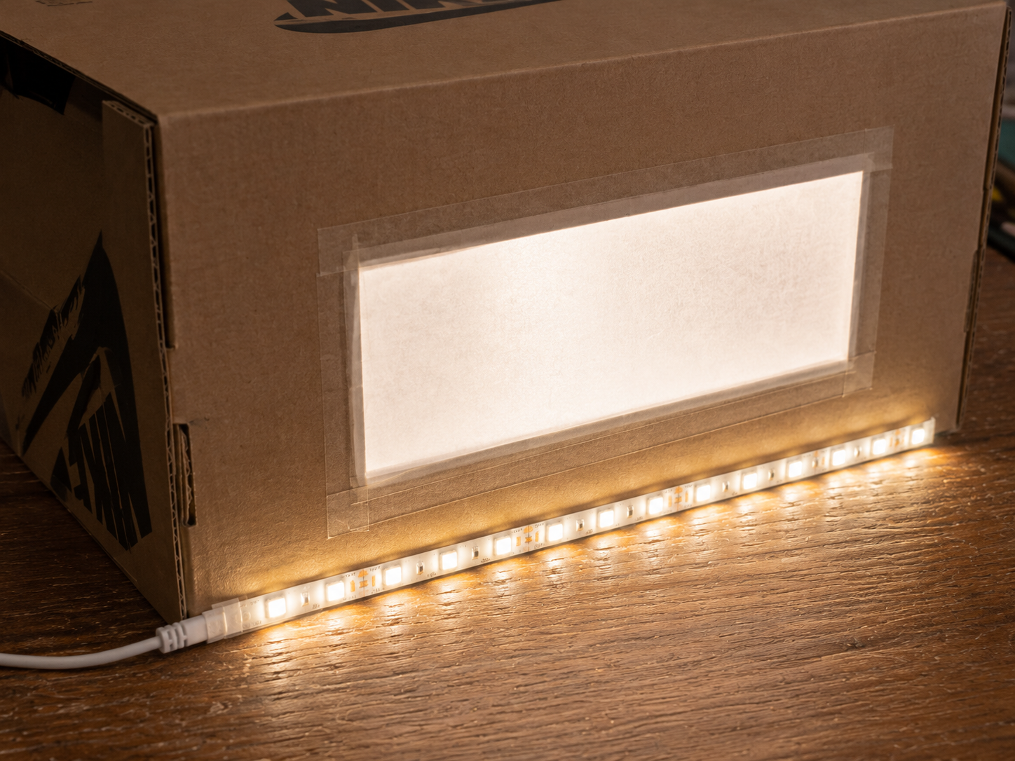 Illuminated Nike shoebox with LED lighting.png