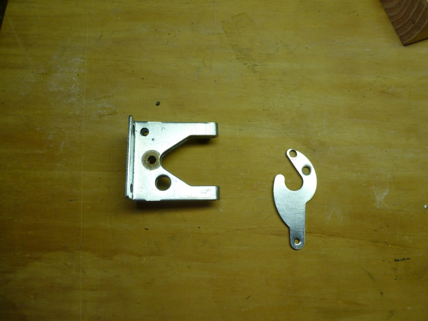 Latch with new holes.jpg