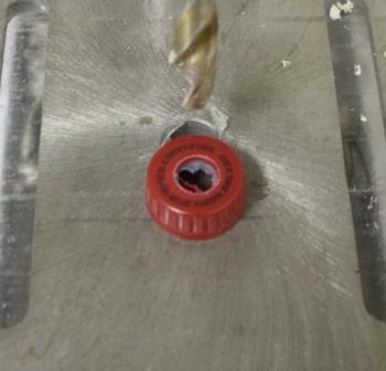Lid after hole drilled.JPG
