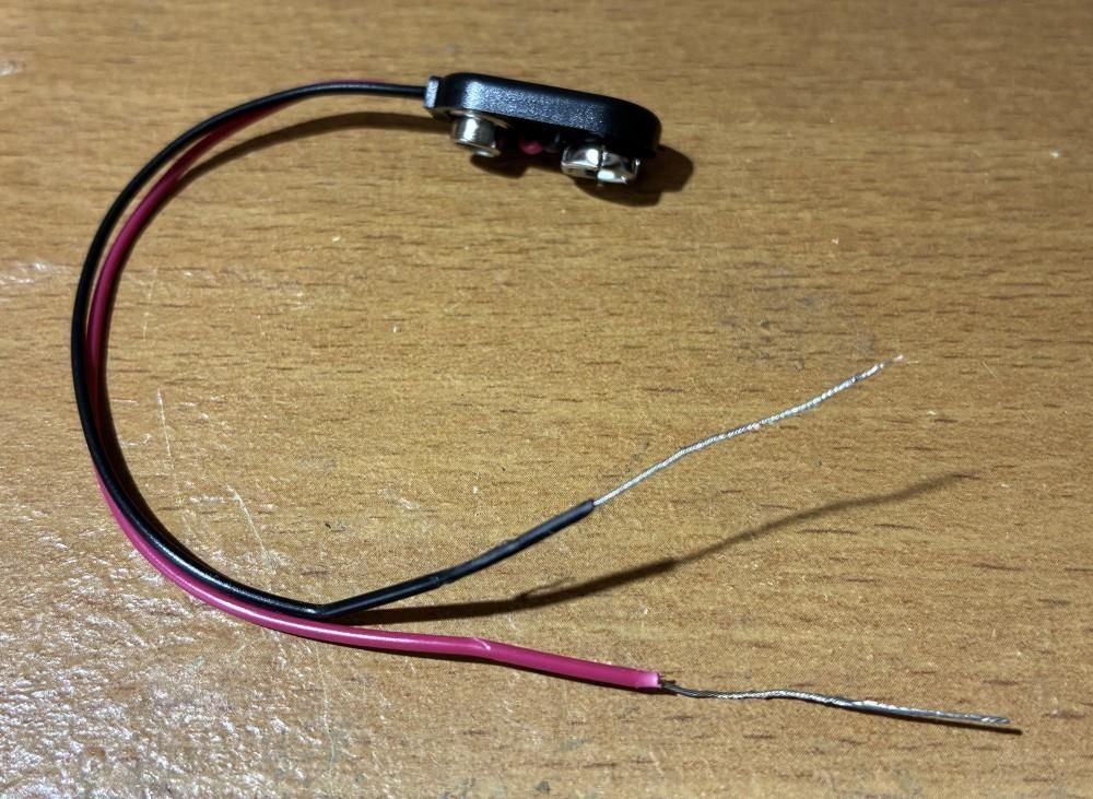 Motion Detecting Dog 03 Step 02 Strip the 9 V Battery Harness Wires.jpg