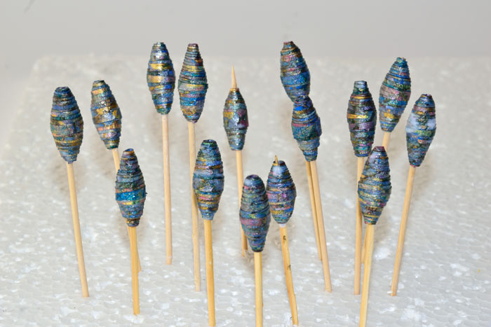 NTPaper-Beads-Drying-On-Sticks.jpg