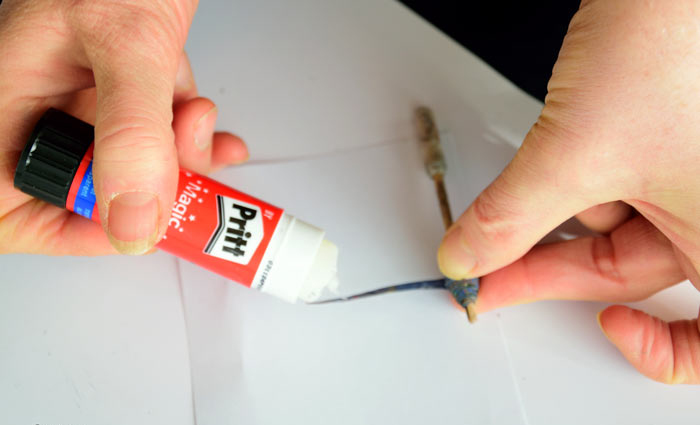 NTPaper-Beads-from-brown-paper-fabric-Sticking-the-end-of-the-bead.jpg