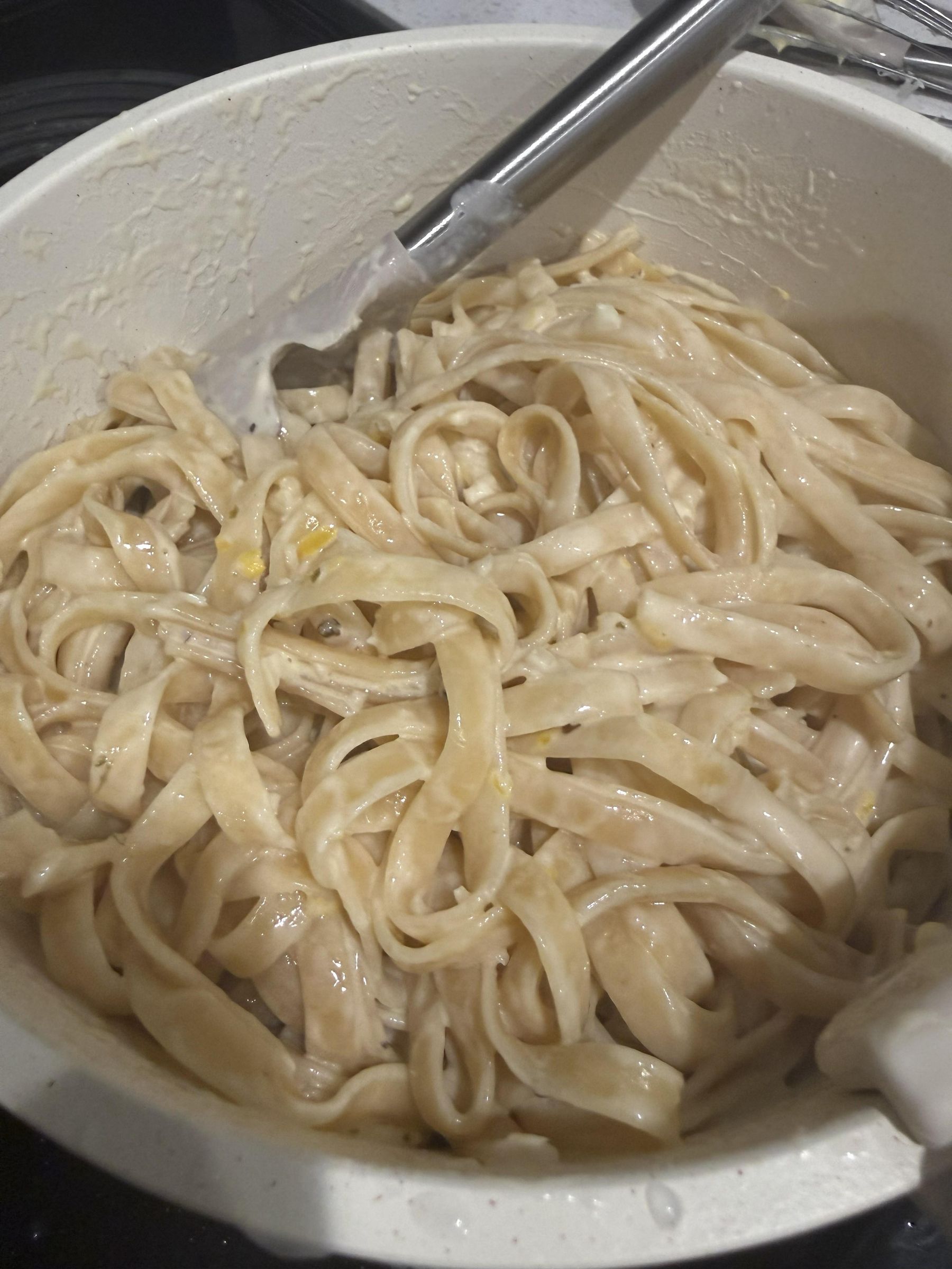 Noodles mixed with sauce.jpg