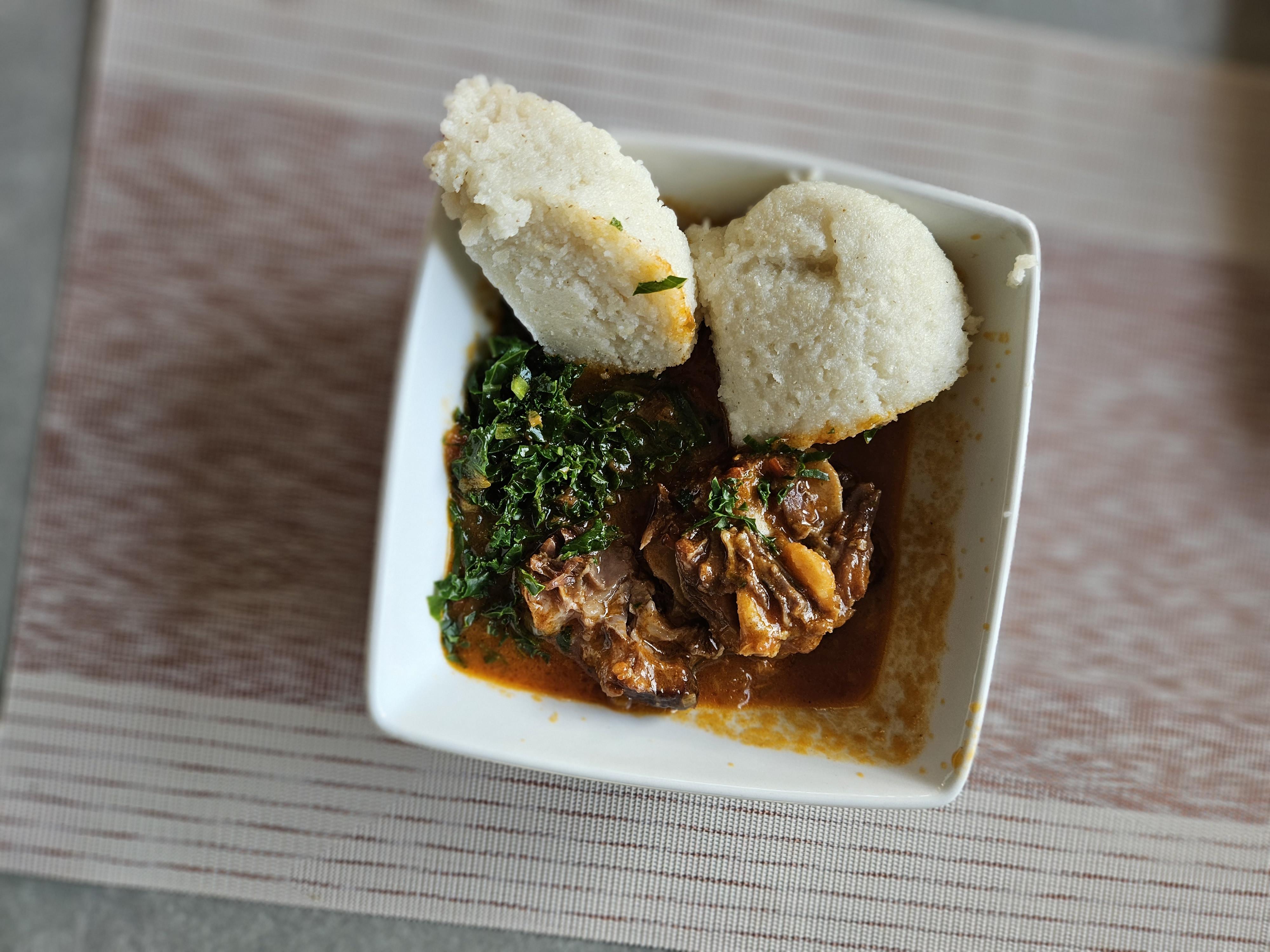 Oxtail soup served with ugali in a bowl 2.jpg