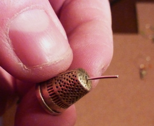 PHOTO threading the thimble.jpg