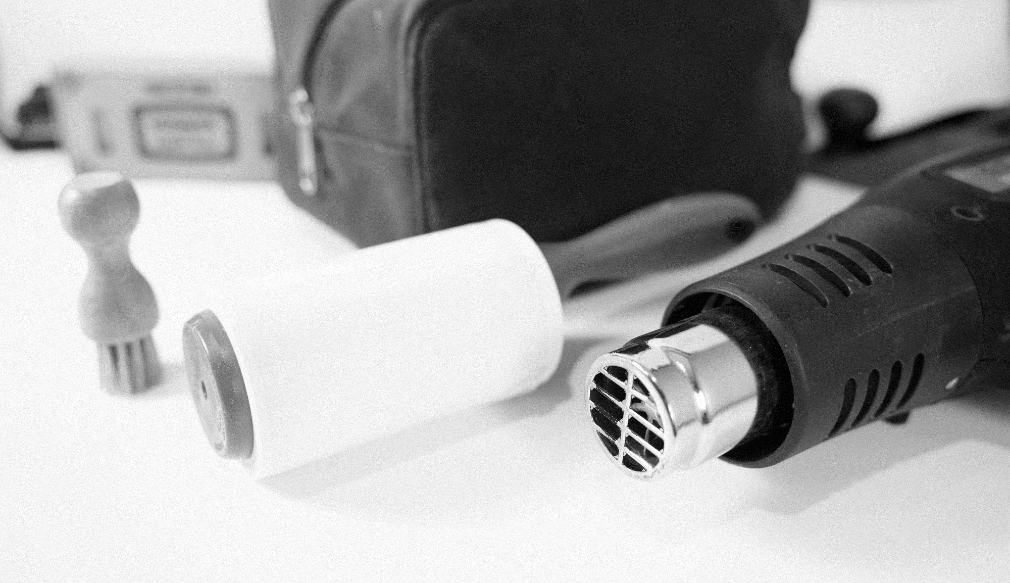 Palm-Brush-Hair-Dry-&amp;-Lint-Roller-to-prepare-for-fabric-wax-application-Black-and-White.png