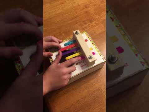 Playing the cigar box kalimba