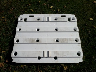 Polystyrene raft with holes.jpg