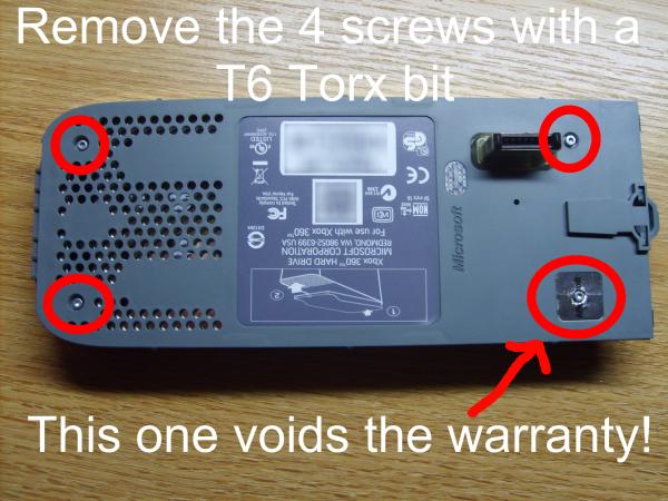 Remove the 4 case screws with a T6 Torx bit.jpg