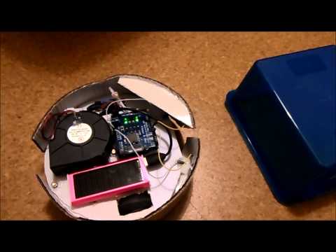 Robot vacuum cleaner from cardboard controlled by Arduino