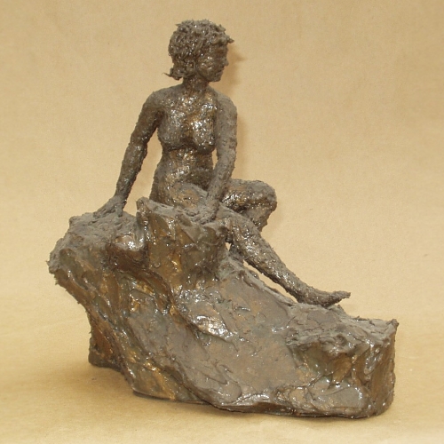 SILICONE WOMAN ON ROCK.jpg