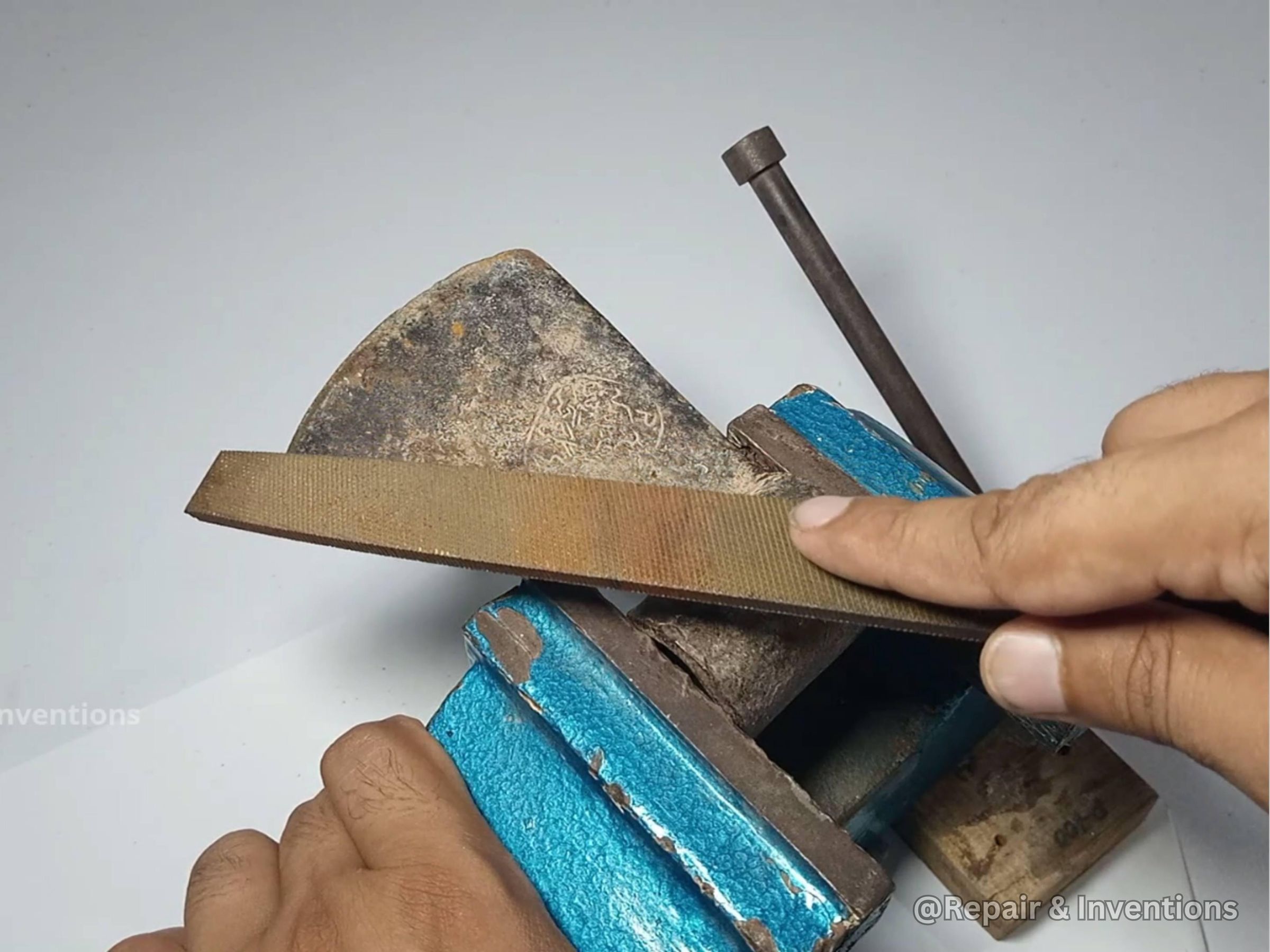 Sharpen the First Side of the Axe Blade.jpg