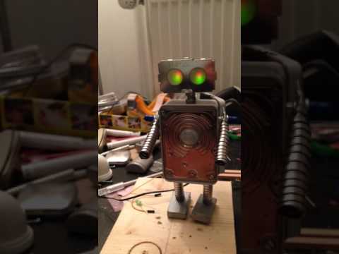 Small motion sensing tin robot guardian