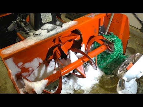 Snow blower gets jammed by garbage net
