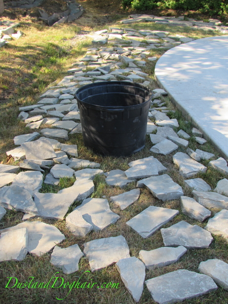 Sort the Stones for the DIY Stacked Stone wall.JPG