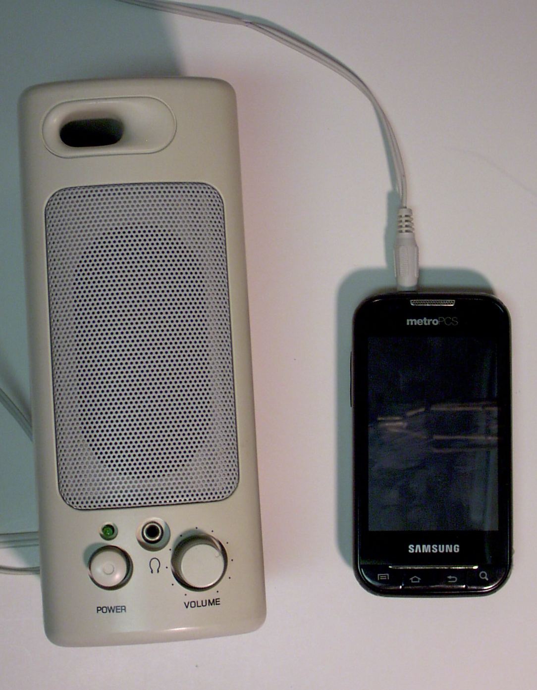 Speaker with cell phone.JPG