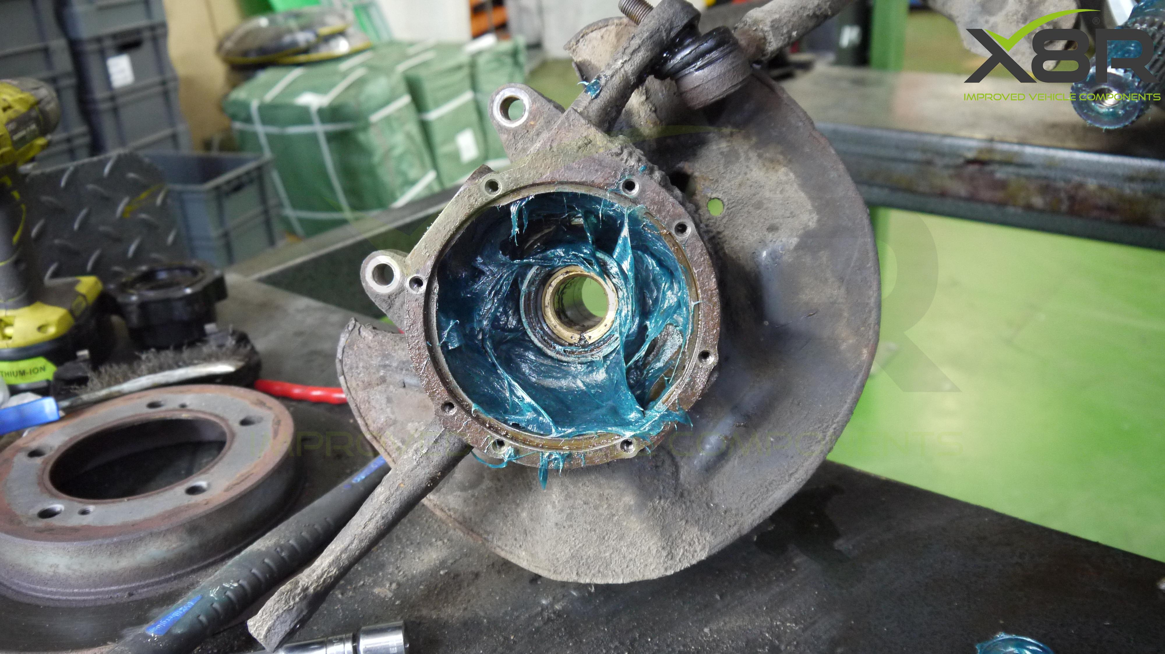 Step 11, cover the swivel kuckle in grease.jpg