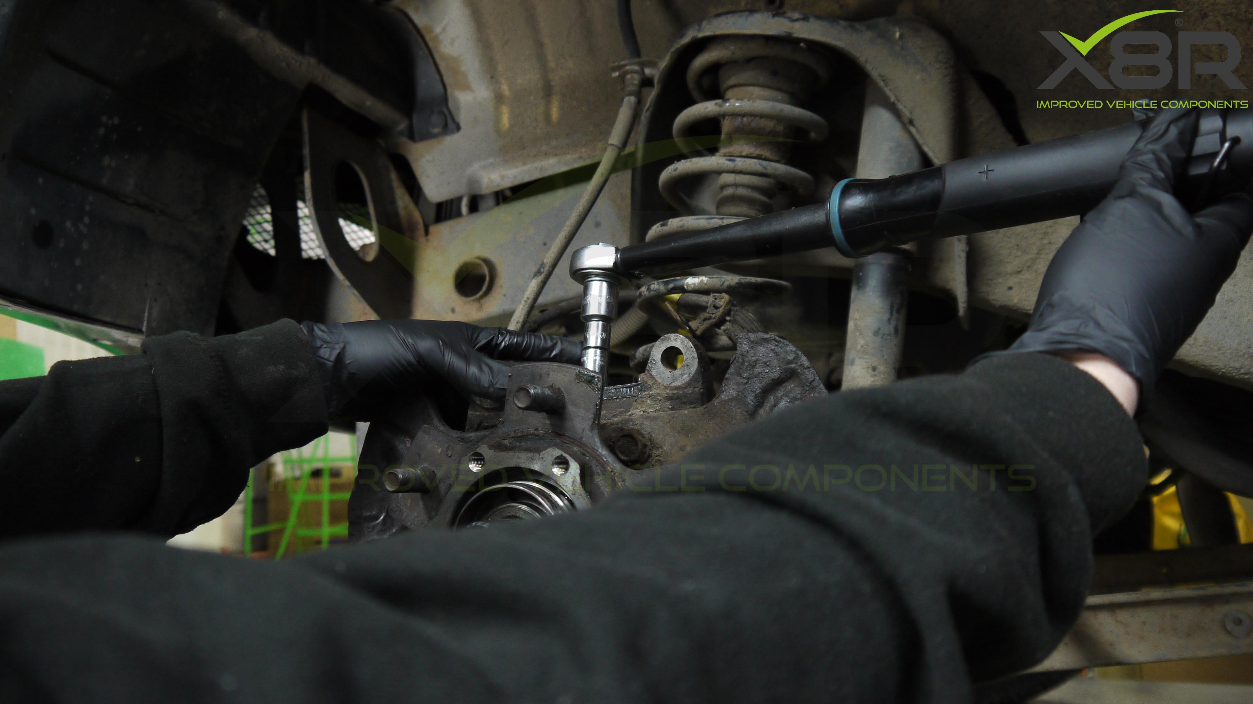 Step 13, torque up kingpin bolts.jpg
